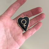 The Venus Heart Shield (Black Heart) Enamel Pin from the Empress card