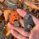 halloween puking pumpkin seeds enamel pin